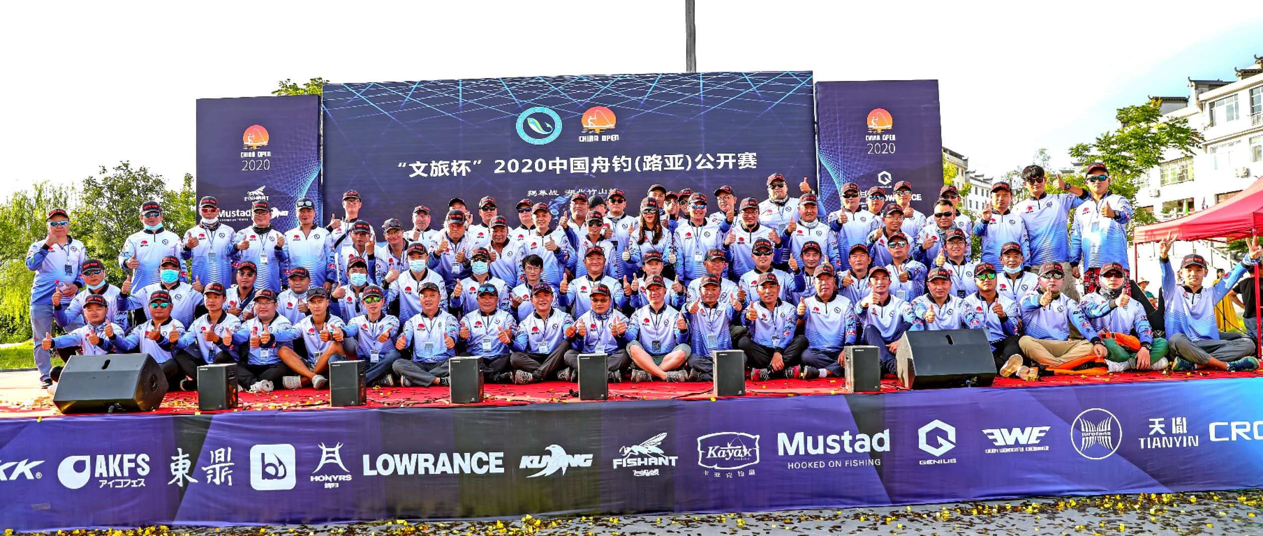 Large group of anglers gathered for a community fishing event
